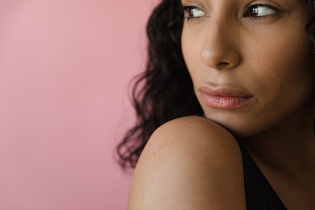 Close-up of a woman with smooth, youthful skin after facial rejuvenation treatment.